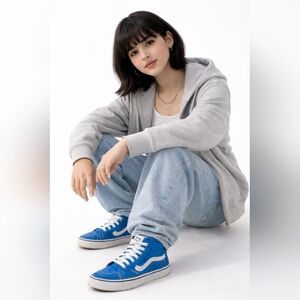 Classic Vans Sk8-Hi high top sneakers in a vibrant blue color with white side